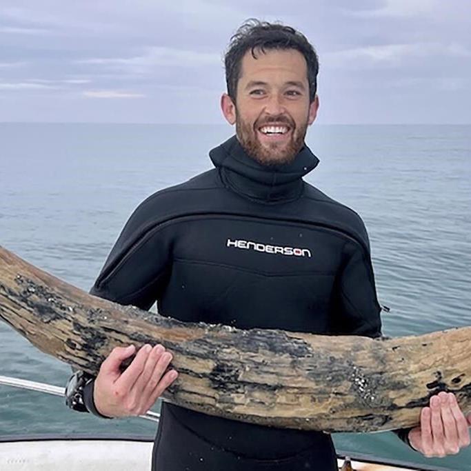 Fossil-hunting diver says he has found a large section of mastodon tusk off Florida's coast